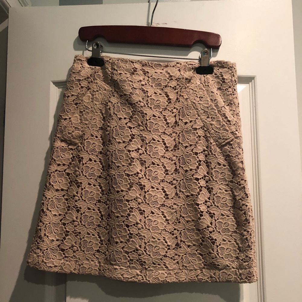 Lace cotton mini skirt.